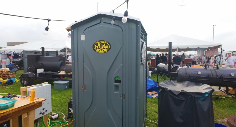 Pelican Events porta potty set up at an outdoor party